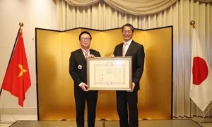 Former Party official granted Japan's Order of Rising Sun