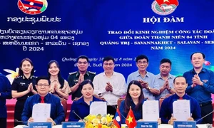 Vietnamese, Lao provinces exchange experience in youth activities