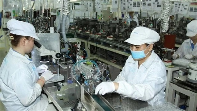 Manufacturing electronic components at Japan-based Nidec Sankyo Ltd Co., Ltd in HCM City's Saigon Hi-Tech Park. (Photo: VNA) HCM City to offer interest rate subsidies for priority projects -0