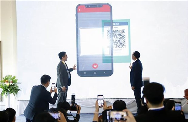 Laos and Thailand launch the cross-border QR payment linkage at a ceremony held in northern Laos' Luang Prabang province on April 3 (Photo: VNA) Laos, Thailand launch cross-border QR payment -0