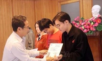 HCM City presents health insurance cards to impoverished people ahead of Tet